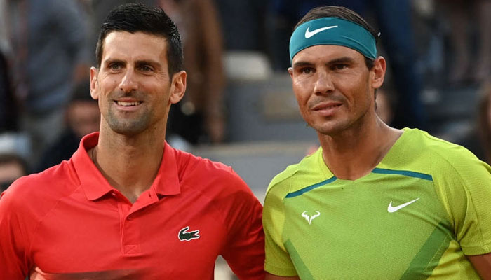 Tennis Players Novak Djokovic (L) and Rafael Nadal posing for a picture. — AFP/File