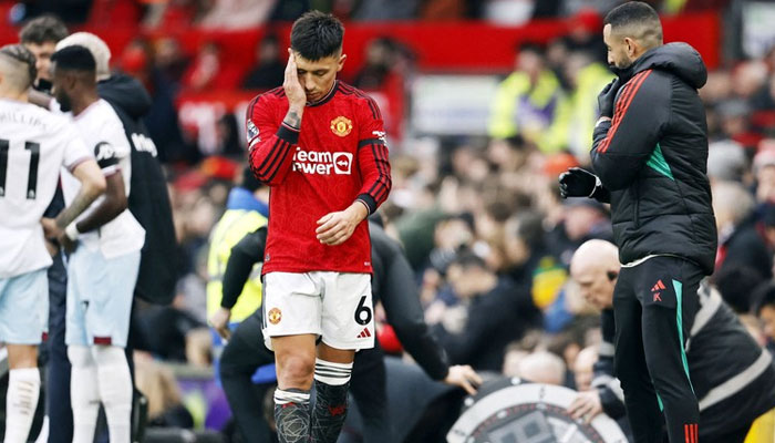 Lisandro Martinez of Manchester United goes off injured during their Premier League football match against West Ham United. — AFP/File