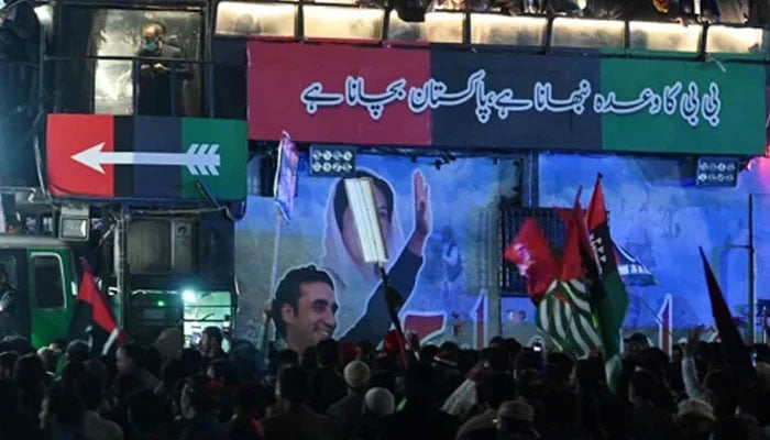 Supporters of the Pakistan-Peoples Party (PPP)  gathered around a truck. — AFP/File