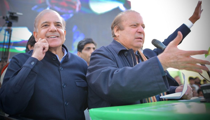 Pakistan Muslim League Nawaz supremo Nawaz Sharif (R) gestures as he addresses a political campaign rally on February 6, 2024, with his brother Shehbaz Sharif (L) looking on. — Facebook/PML(N)