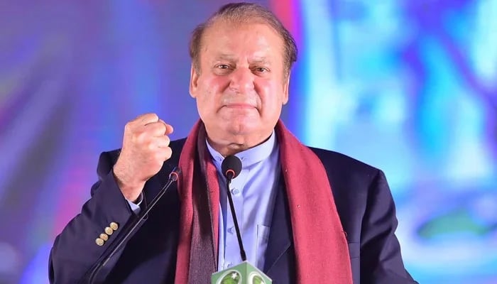 PMLN supremo and former Prime Minister Mian Nawaz Sharif makes a fist during a massive power show in Lahore after returning to Pakistan on October 21, 2023. — Facebook/PMLN