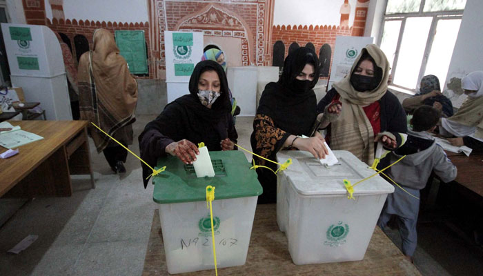 The ballot casting process is underway at the polling station during General Elections 2024, held in Peshawar on Thursday, February 8, 2024. — PPI