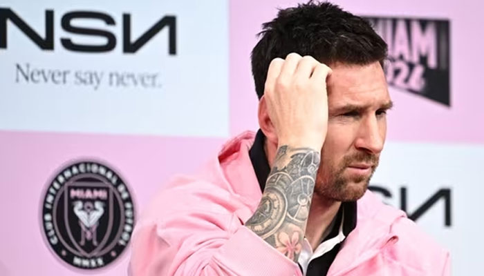Lionel Messi reacts after taking a question about his teams previous match in Hong Kong. — AFP/File