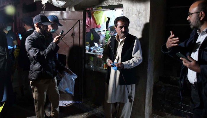 Security officials examine the site of a bomb blast in Provincial Capital on February 7, 2024. — Online