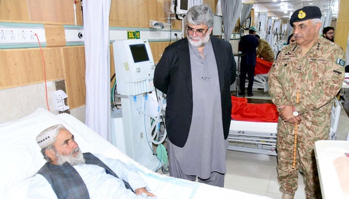 Caretaker Balochistan Chief Minister Mir Ali Mardan Khan Domki and Corps Commander 12 Quetta Lt General Rahat Naseem Khan inquired to the patient about the health of Pishin and Killa Saifullahs blast victims on February 8, 2024. —Facebook/Directorate of Public Relations Balochistan