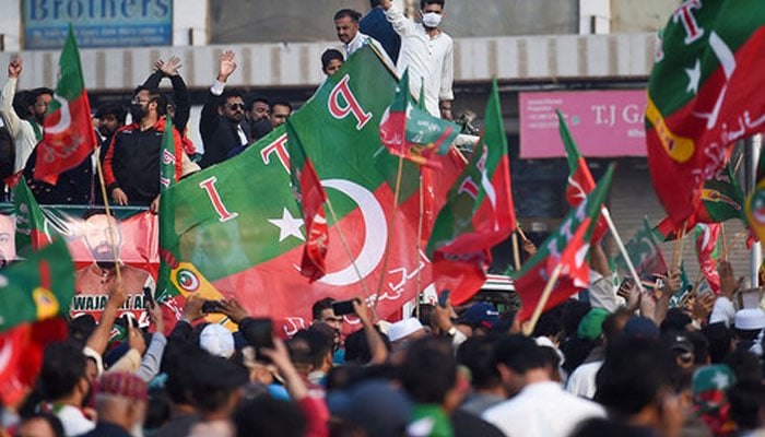 Supporters of the PTI party shout slogans and protest to demand the release of Pakistan’s jailed former prime minister Imran Khan, in Karachi on January 28, 2024. (AFP)