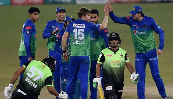 Multan Sultans players celebrate the dismissal of Lahore Qalandars Zeeshan Ashraf (2R) during the Pakistan Super League final cricket match between Lahore Qalandars and Multan Sultans at the Gaddafi Cricket Stadium in Lahore. — AFP/File