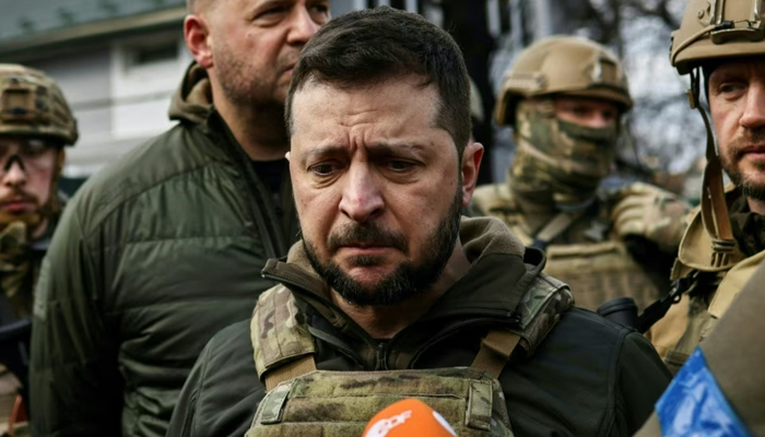 Ukrainian President Volodymyr Zelenskiy speaks to reporters after seeing the carnage in Bucha firsthand. — AFP/File