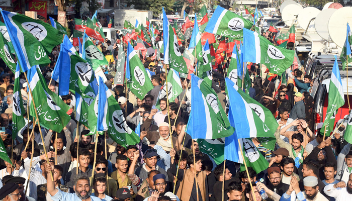 Supporters of the Jamaat-e-Islami protest and PTI against riggings in general elections outside the Election Commission Office, in Karachi on February 10, 2024. — Online