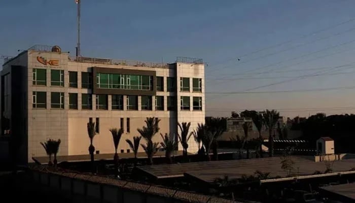 A view of the K-Electric head office, with solar panels at the parking area, in Karachi, January 24, 2023. — AFP