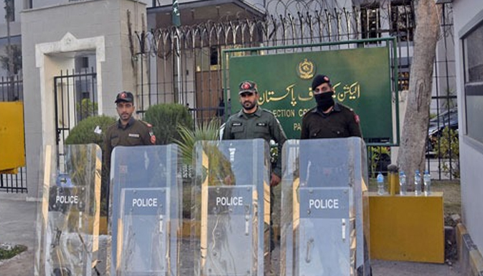 Frontier Constabulary (FC) personnel stand alert in front of the Election Commission office in the Federal Capital on February 9, 2024. —  Online