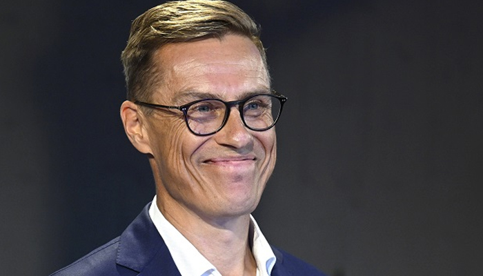 Alexander Stubb of The National Coalition Party gives a smile during a press conference in Helsinki on August 16, 2023. — AFP