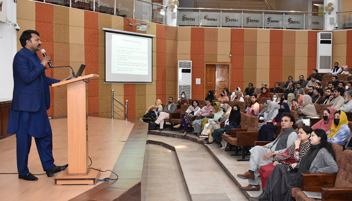 Participant speaks at an orientation event for academic session 2024-25 at Khyber Medical University (KMU) on February 12, 2024. — Facebook/Khyber Medical University, Peshawar, Khyber Pakhtunkhwa