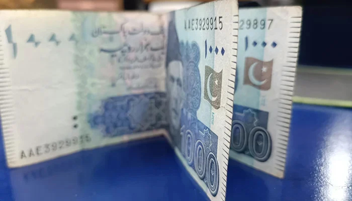 This image taken on January 13, 2024, shows Pakistani currency notes of thousands. — Geo.tv/Saad Aalam Angaria