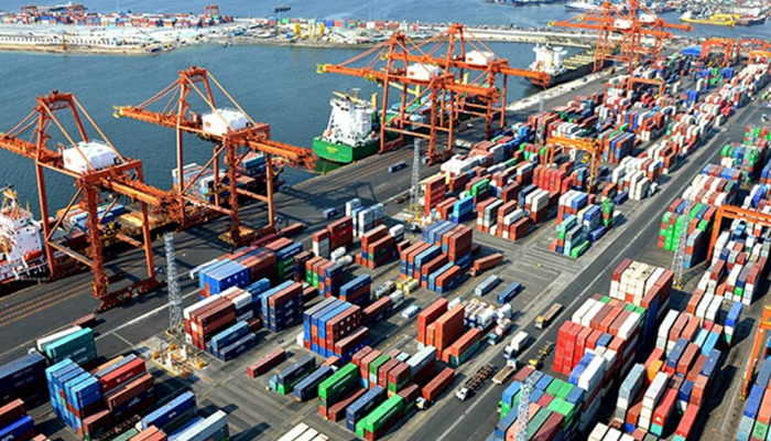 This image shows a shipping activity at Port Qasim. — APP/File
