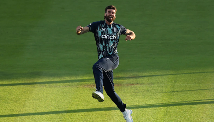England bowler Reece Topley jumps during a match. — AFP/File