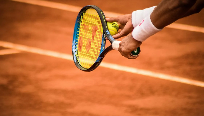 A representational image of a person during a tennis match. — Pexels