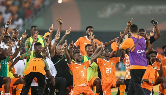 Jubilant Ivory Coast players celebrate making the Africa Cup of Nations final on home turf. — AFP/File