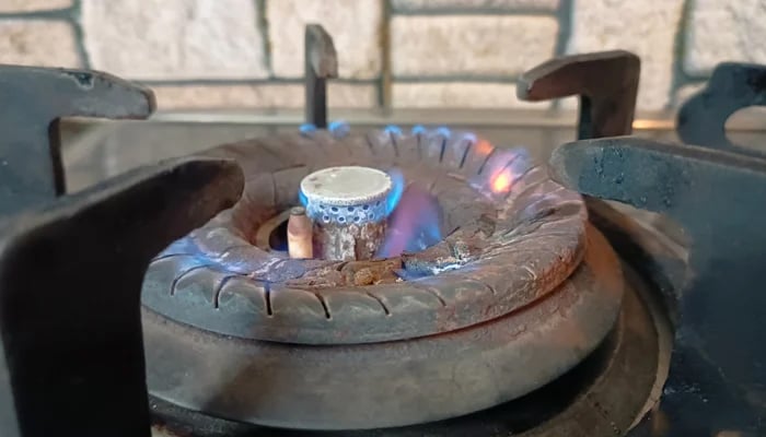 This image taken on January 10, 2024, shows a low gas flame due to a low gas pressure in a household in Karachi. — Geo.tv/Saad Aalam Angaria