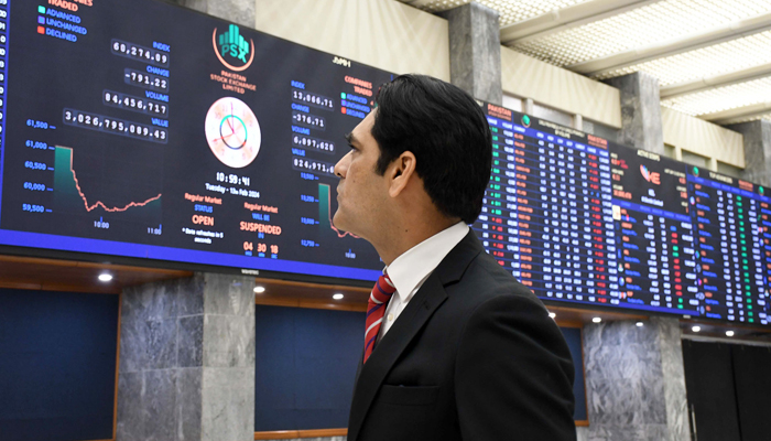 A stock broker watches share prices during a trading session at the Pakistan Stock Exchange (PSX) in the Provincial Capital on February 13, 2024. — Online