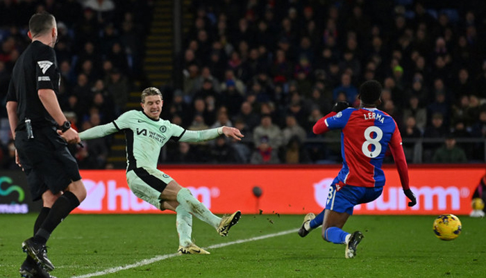 Chelseas English midfielder Conor Gallagher shoots to score their second goal during the English Premier League football match between Crystal Palace and Chelsea at Selhurst Park in south London on February 12, 2024. — AFP