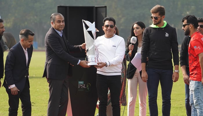 The PCB chairman Mohsin Naqvi (L) holds the PSL 9 trophy during the unveiling ceremony at the polo ground on February 13, 2024. — Facebook/Pakistan Super League