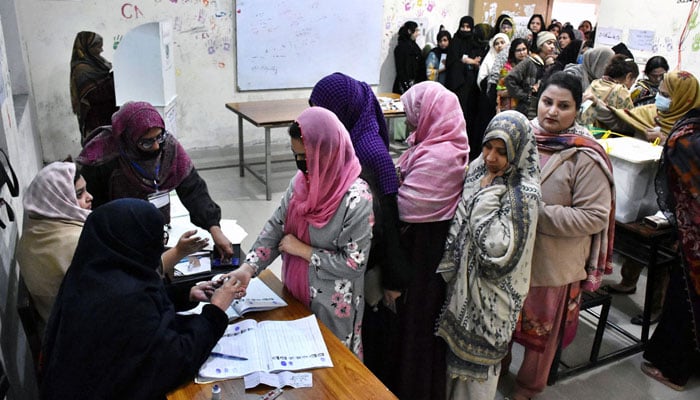 A large number of women can be seen in this picture in the queue to cast their vote in the general election on Feb 8, 2024, in Lahore. — APP