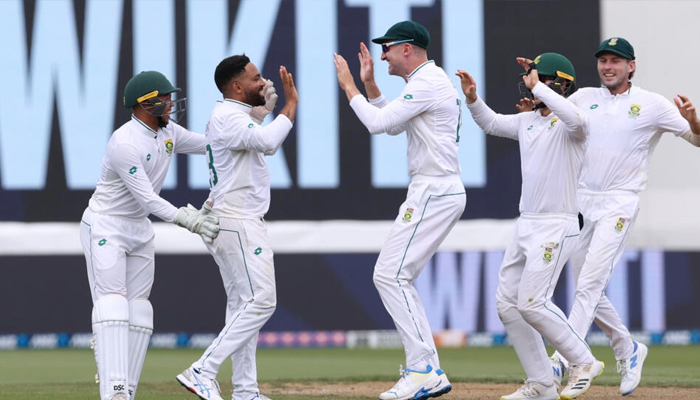 South Africa players celebrate the dismissal of New Zealand batter Kane Williamson on February 14, 2024. — AFP