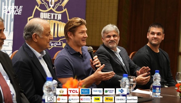 Quetta Gladiators Director and former Pakistan captain Moin Khan (R) looks toward Shane Watson as the Australian speaks during an MoU signing ceremony in Lahore on February 15, 2024. — Facebook/Quetta Gladiators