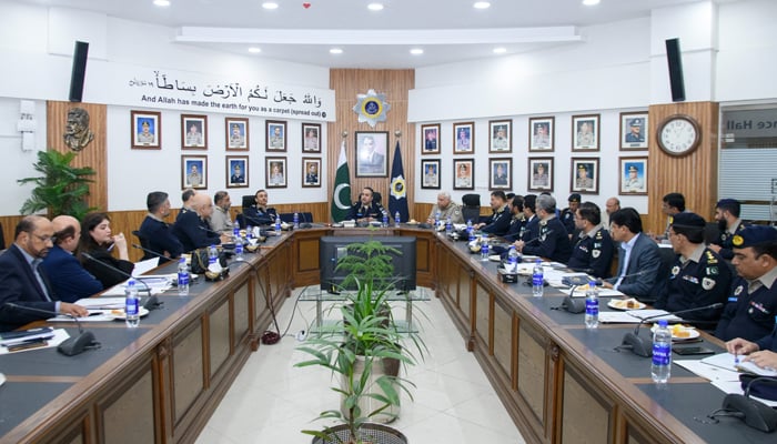 This image released on January 15, 2024, shows NHMP IG Salman Chaudhry chairing a meeting at the Central Police Office of NH&MP. — The National Highways and Motorway Police website