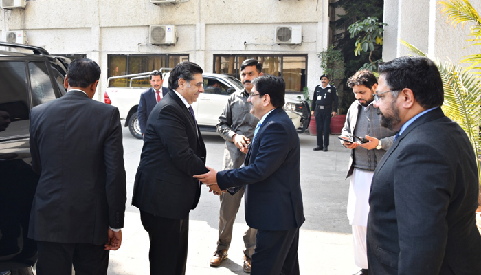Caretaker Interior Minister Dr. Gohar Ijaz (L) meets with the Federal Investigation Agencys DG Ahmad Ishaque Jehangir at the FIA HQs in Islamabad on February 15, 2024. — Facebook/Federal Investigation Agency - FIA