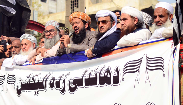 Jamiat Ulema-e-Islam (JUI-F) Secretary General Sindh, Rashid Mahmood Soomro addresses during the protest demonstration against alleged rigging in General Election 2024, outside Provincial Election Commission Office in Karachi on Thursday, February 15, 2024. — PPI