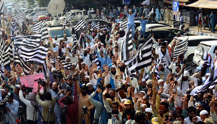 Activists of Jamiat Ulema-e-Islam (JUI-F) are holding a protest demonstration against alleged rigging in the General Election 2024, outside the Provincial Election Commission Office in Karachi on February 15, 2024. — PPI