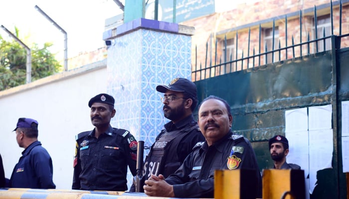 Police officials are standing on high alert amid the protest demonstration of PTI against rigging in General Election 2024, in Karachi on February 9, 2024. — PPI