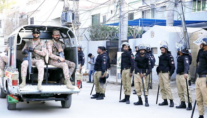 Police personnel stand guard outside the Election Commission of Pakistan Hyderabad on February 10, 2024. — INP