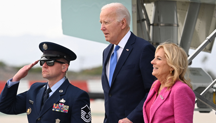 US President Joe Biden and First Lady Jill Biden disembark from Air Force One upon arrival at Los Angeles International Airport in Los Angeles, California, February 3, 2024. — AFP