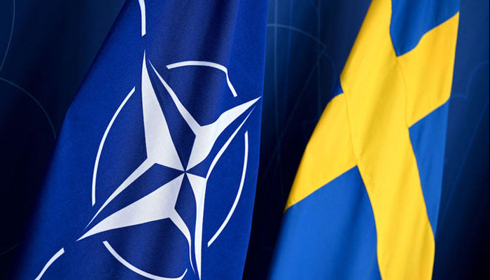 Nato (L) and Sweden flags can be seen in this image. — AFP/File