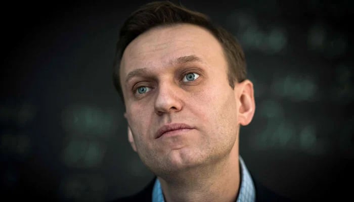 Kremlin critic by far the most prominent opposition leader in Russia Alexei Navalny looks on during a gathering. — AFP/File