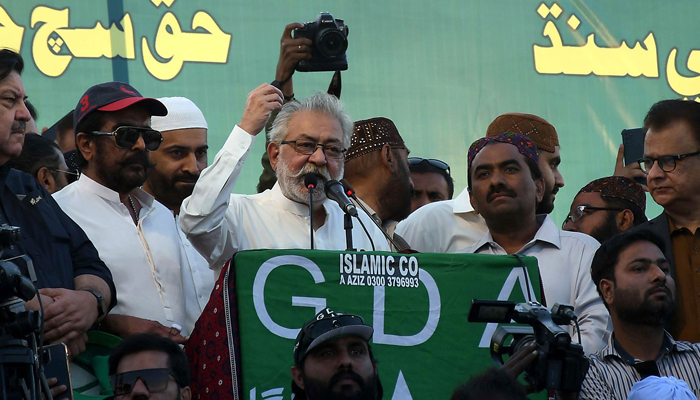 Sibghatullah Shah Rashdi Pir Pagara (VIII) addressing the supporters of the Grand Democratic Alliance (GDA) during a protest rally in Jamshoro on February 16, 2024. — INP