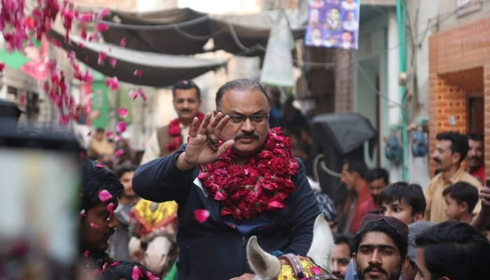 PTI leader and newly-elected MNA Malik Amir Dogar gestures during a campaign rally on February 6, 2024. — Facebook/Malik Aamir Dogar NA-155