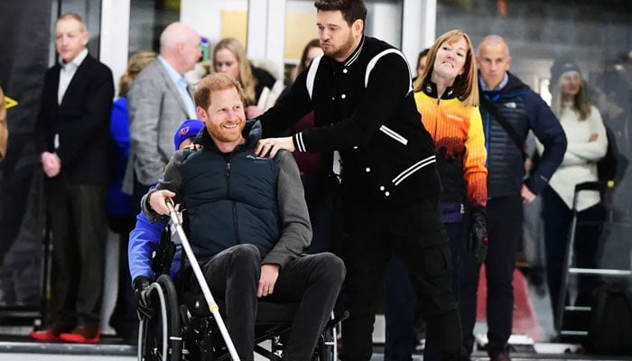 Prince Harry, Duke of Sussex, and Michael Bublé. — AFP