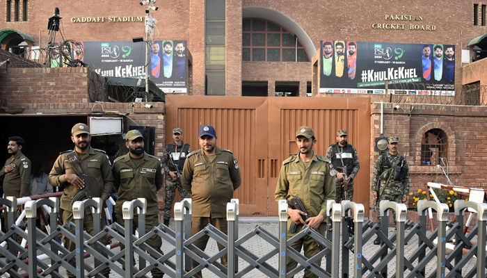 Security personnel stand guard ahead of the start of the Pakistan Super League (PSL-9) Twenty20 cricket match inauguration ceremony at Gaddafi Stadium, in Lahore. — Online