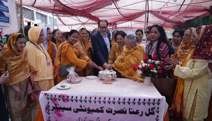 Sindh Caretaker Minister for Information, Minority Affairs, and Social Protection Muhammad Ahmed Shah cut a cake to celebrate the 75th founding anniversary of Gul Rana Nusrat Community Centre on February 17, 2024. — Facebook/Mohammad Ahmed Shah