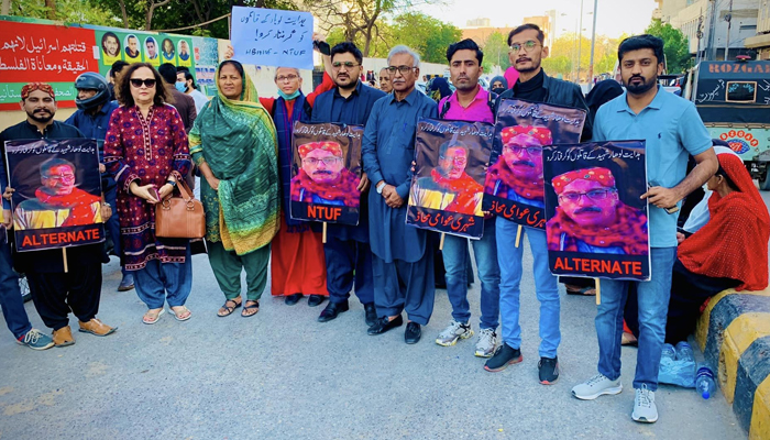Activists hold Hidayat Lohars placards to protest against the killing of prominent political leader and intellectual Hidayat Lohar at the Karachi Press Club on February 17, 2024. — Facebook/Shehzad Mughal