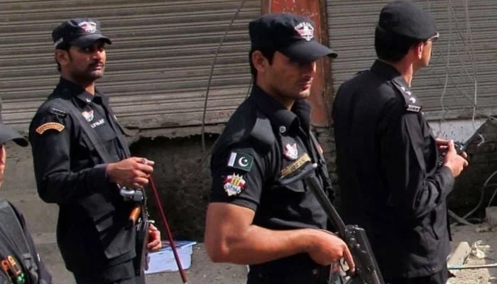KP Police personnel patrol area after an attack in Swat. — AFP/File