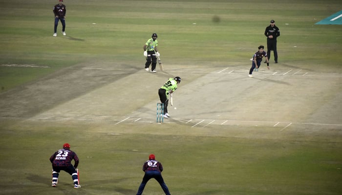 Lahore Qalandar Shabzida Farhan plays a shot during the Pakistan Super League (PSL) Twenty20 cricket match between Islamabad United and Lahore Qalandars at the Gaddafi Cricket Stadium on February 17, 2024. — Online