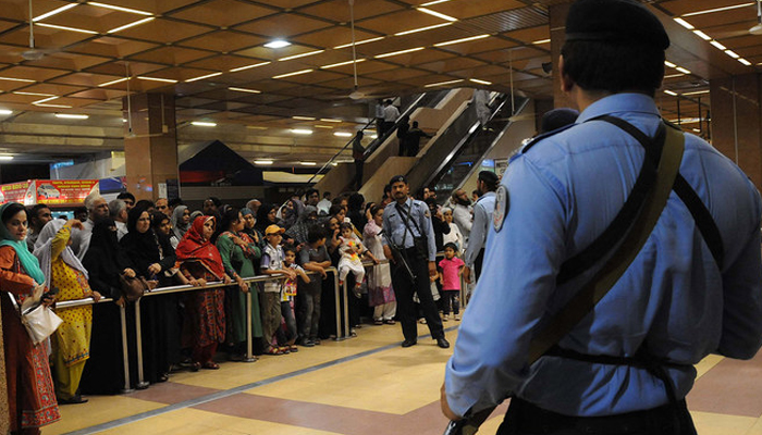 Pakistani Airports Security Force (ASF) personnel stand guard at Jinnah International Airport in Karachi.—  AFP/File