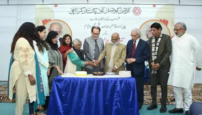Sindh Caretaker Information Minister and ACP President Muhammad Ahmed Shah (C) cut a cake along with participants in the event titled Tum Jeeo Hazaro Saal... Poetry Dialogue at the Arts Council of Pakistan on February 16, 2024. — Facebook/Arts Council of Pakistan Karachi