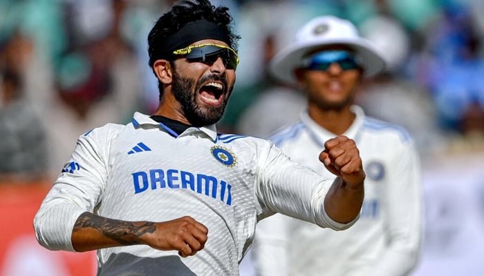 Indias Ravindra Jadeja celebrates after taking the wicket of Englands Joe Root on February 18, 2024. — AFP