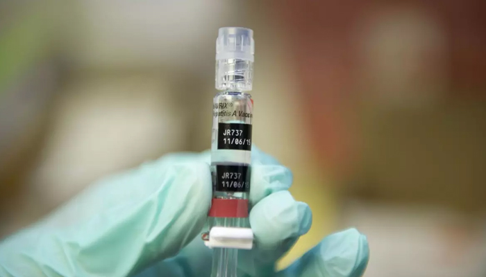 A nurse loads a syringe with a vaccine against hepatitis B. — AFP/File